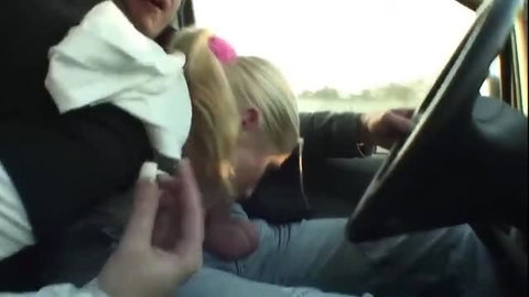 Blonde woman giving oral in car during public sex video