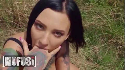 Adel Asanty flashing tattoos and pink nails in outdoor Mofos scene