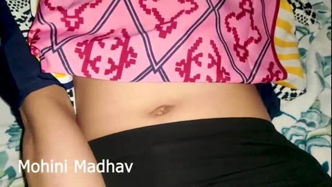Indian model Mohini Madhav showing bare midriff in pink top