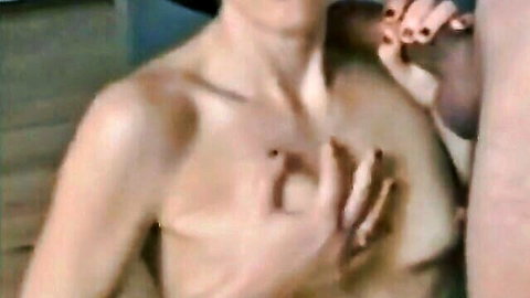 Topless blonde giving intense blowjob, hand guiding her head