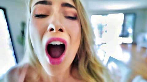 Scarlet Chase blonde with open mouth in ecstasy, lingerie model close-up
