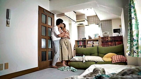 Meisa Kawakita in intimate standing embrace and kiss with lover, big breasts JAV softcore tease