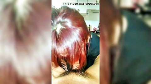 Korean woman with red hair, close-up neck view in intimate adult scene