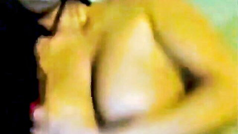 Christine Mendoza topless webcam tease, tan Asian beauty exposing big natural tits