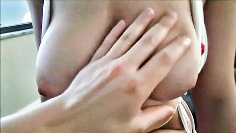 POV hand groping and squeezing busty woman's massive bare tits in white tank top