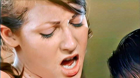 Young redhead with mouth wide open moaning intensely during blowjob