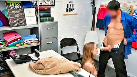 Blonde woman sucking muscular man's hard cock in clothing store blowjob