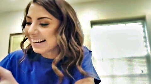 Ava Eden, slutty American teen brunette smiling in blue top on set