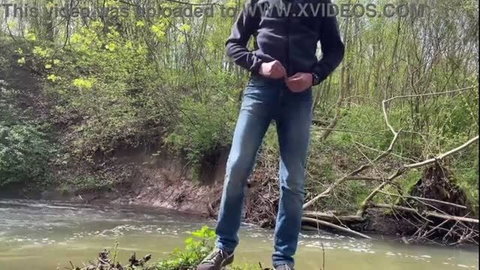 Horny fat guy jerking cock outdoors by lakeside