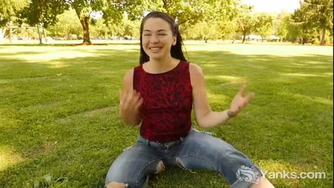 Lilith Wilder masturbating in red top and jeans outdoors
