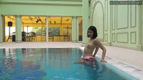 Lady Dee swimming underwater in pink shorts, cute Czech teen