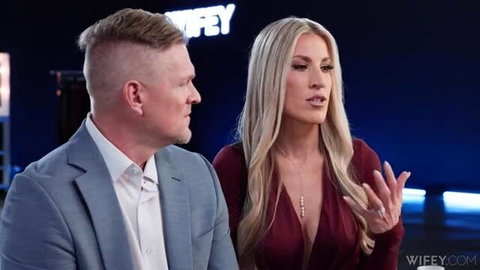Britt Ramsey blonde hotwife in low-cut dress performing for her man