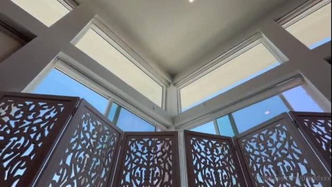 Mei Cornejo anal video thumbnail with intricate wooden room divider