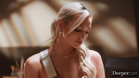 Aubrey Lovelace in elegant gold jewelry and white straps, soft seductive lighting