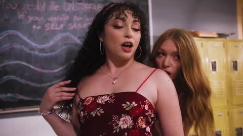 Myra Moans and Pixie Smalls in red dress intimate scene