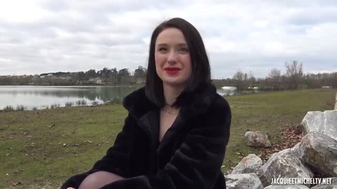 Alice Drake fake shy naughty look in black fur coat by lake