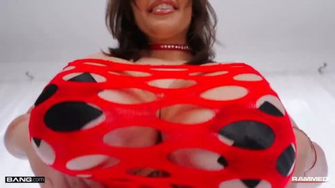 Vivian Taylor in red cutout outfit showing massive tits