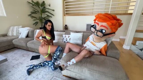 Sandy Love in neon lingerie with Porn Dude mascot on couch