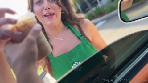 Cindy Lopes in green Starbucks apron taking food at drive-thru
