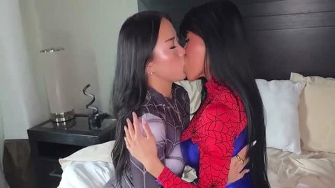Ember Snow and Vivienne Vo making out passionately in Spider-Gwen and Spider-Man suits