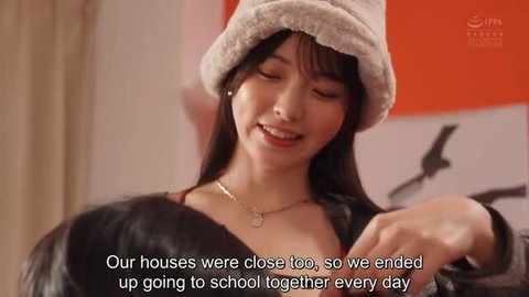 Nao Satsuki in fuzzy hat, smiling, topless in intimate scene