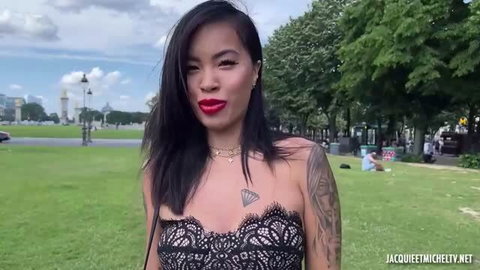 Jade Jade in black lace lingerie with red lips and tattoos