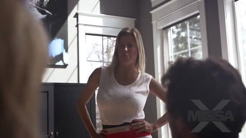 Alexis Fawx in white top hands on hips confronting man in MissaX scene