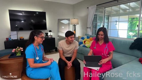 Hailey Rose and nurse in pink scrubs with patient in living room physical scene
