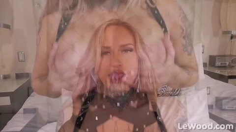 Stephanie Love blonde with big tits and tattoos giving ATM blowjob