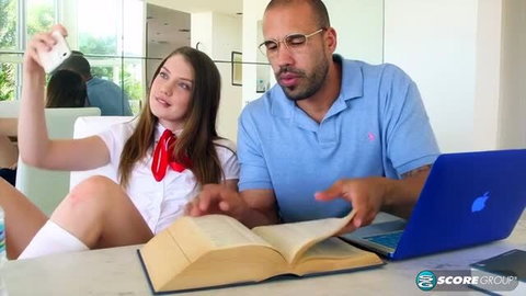 Elena Koshka in schoolgirl outfit taking selfie with older man and laptop