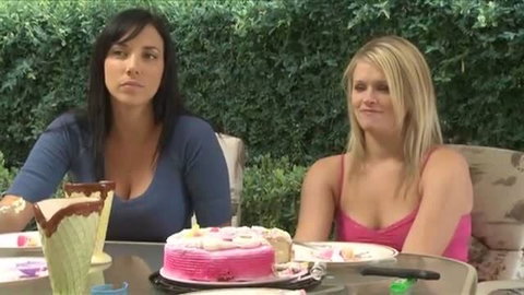 Sara Stone and blonde in pink top with birthday cake