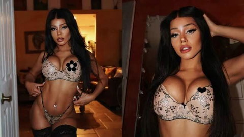 Busty brunette in sheer floral lingerie, black heart pasties, thigh-high stockings