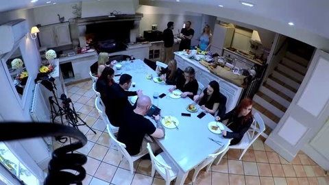 Group dinner scene in OnlyFans house reality porn episode