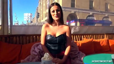 Lylou in black leather corset, Marseille café outdoor scene