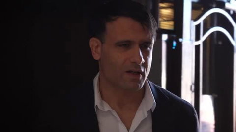 Jade Jadore in close-up wearing formal attire