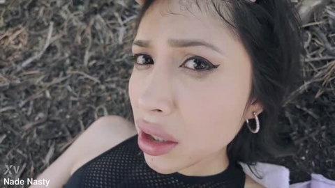 Penelope Woods lying on jungle floor looking up with open mouth
