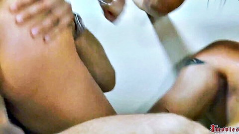 Julia Ann in intense orgy with multiple partners, big tits exposed