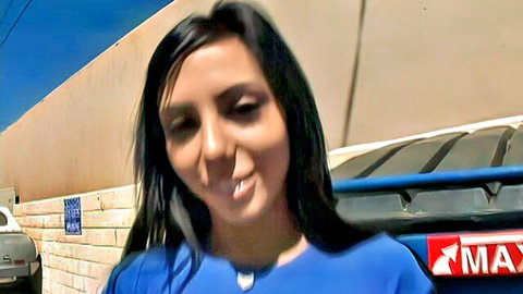 Lela Star smiling in blue top outdoors, teasing for multiple facial cumshots