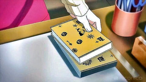 Hentai anime gloved hand grabbing yellow enchanted book on desk with stars and locks
