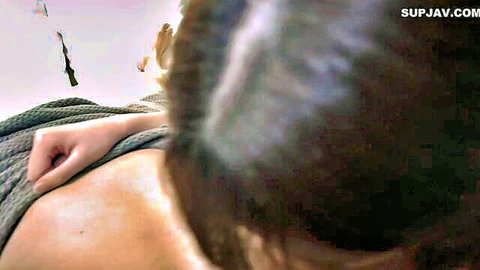 Big tits Japanese woman lying seductively on bed in POV view
