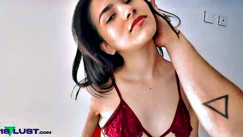 Seductive Latina in sheer red lace bra with tattooed hand gripping her neck