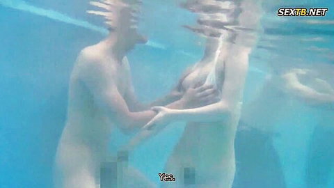 Underwater nude couple with guy groping Japanese babe's big wet tits