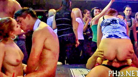 Wild orgy with woman bent over butt grabbed, kissing couple in group party scene