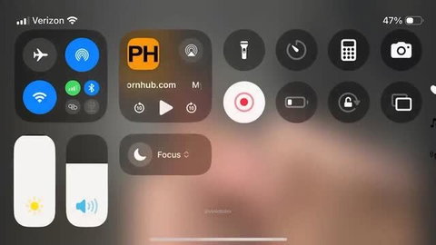 PH icon shown in iPhone control center with onlyfans model video