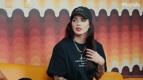 Keisha Grey in black cap and t-shirt during PlugTalk interview