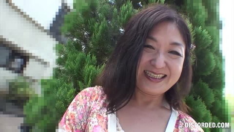 Chiyo Yamabe mature Asian woman smiling outdoors