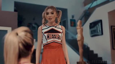 Mackenzie Moss in cheerleader outfit confronting blonde woman