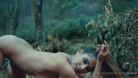 Poonam Pandey nude outdoors posing in forest, full body