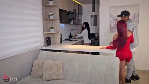 Man and two women in tight outfits in modern kitchen, threesome setup
