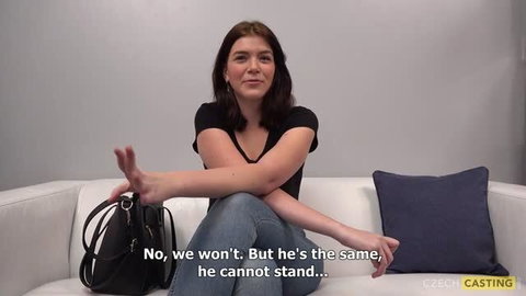Sandy in black top on couch during Czech Casting interview